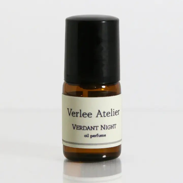 Bottle of Verlee Atelier Verdant Night oil perfume on a white background