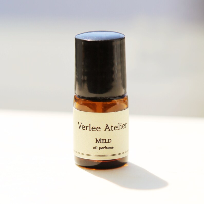 Bottle of Verlee Atelier Meld oil perfume on a white background