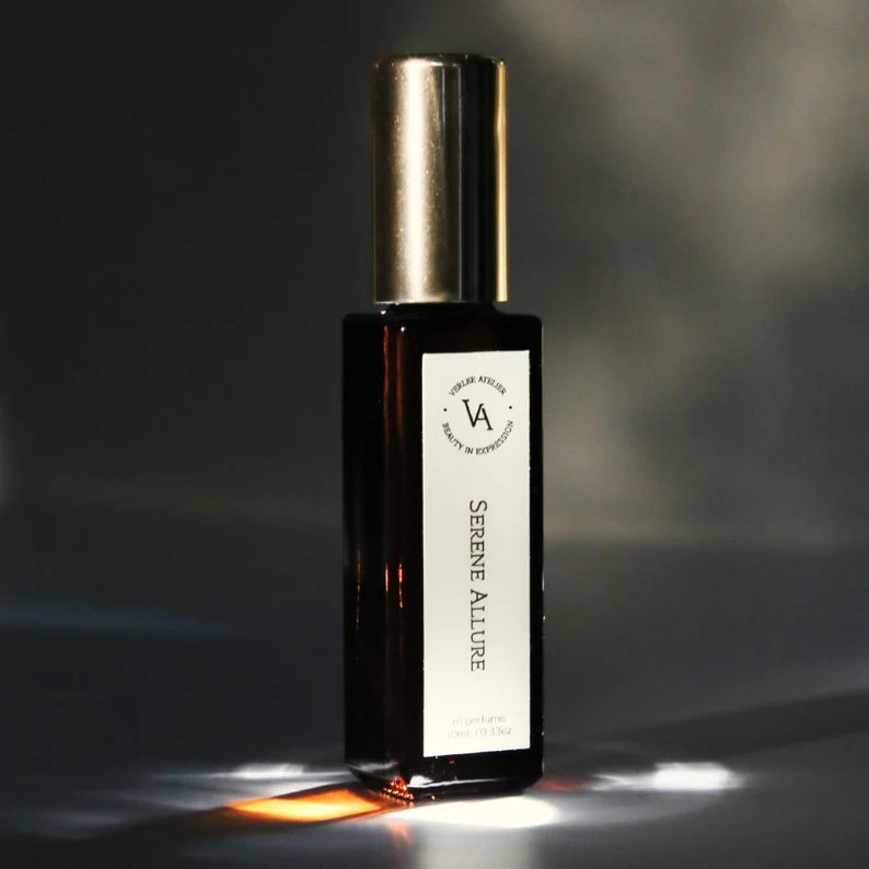 Perfume bottle labeled 'Serenne Allure' with a dark background