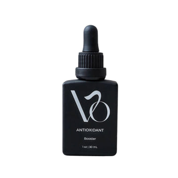 Black bottle with dropper labeled 'VO Antioxidant Booster' on a white background