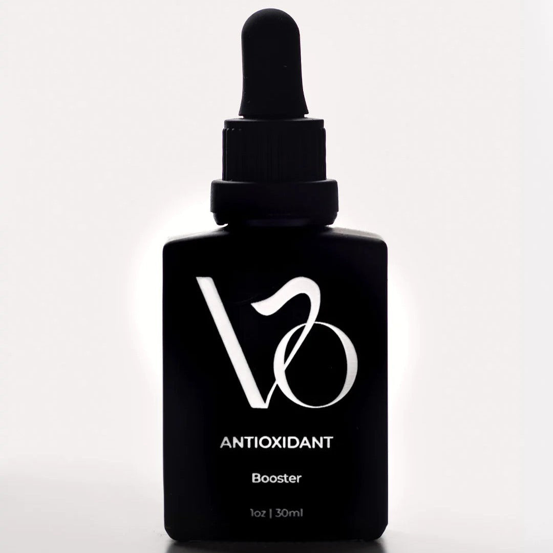 Black bottle with dropper labeled 'VO' on a white background