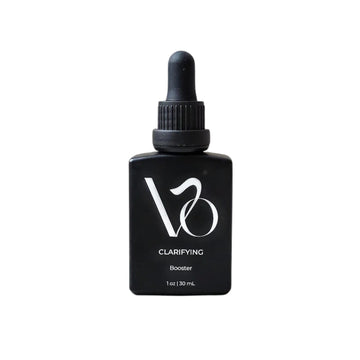 Black bottle with dropper labeled 'VO' on a white background