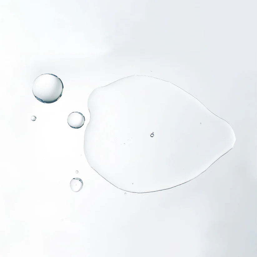 Close-up of water droplets on a white background