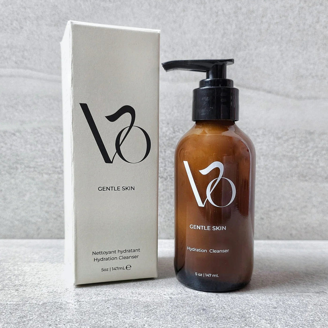Brown bottle with black pump labeled 'VO Gentle Skin' on a white background