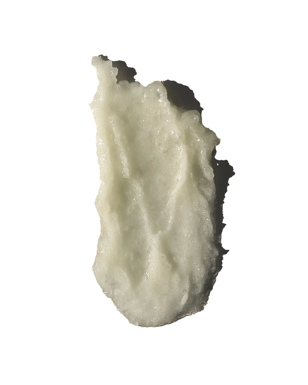 White cream or paste swatch on a white background