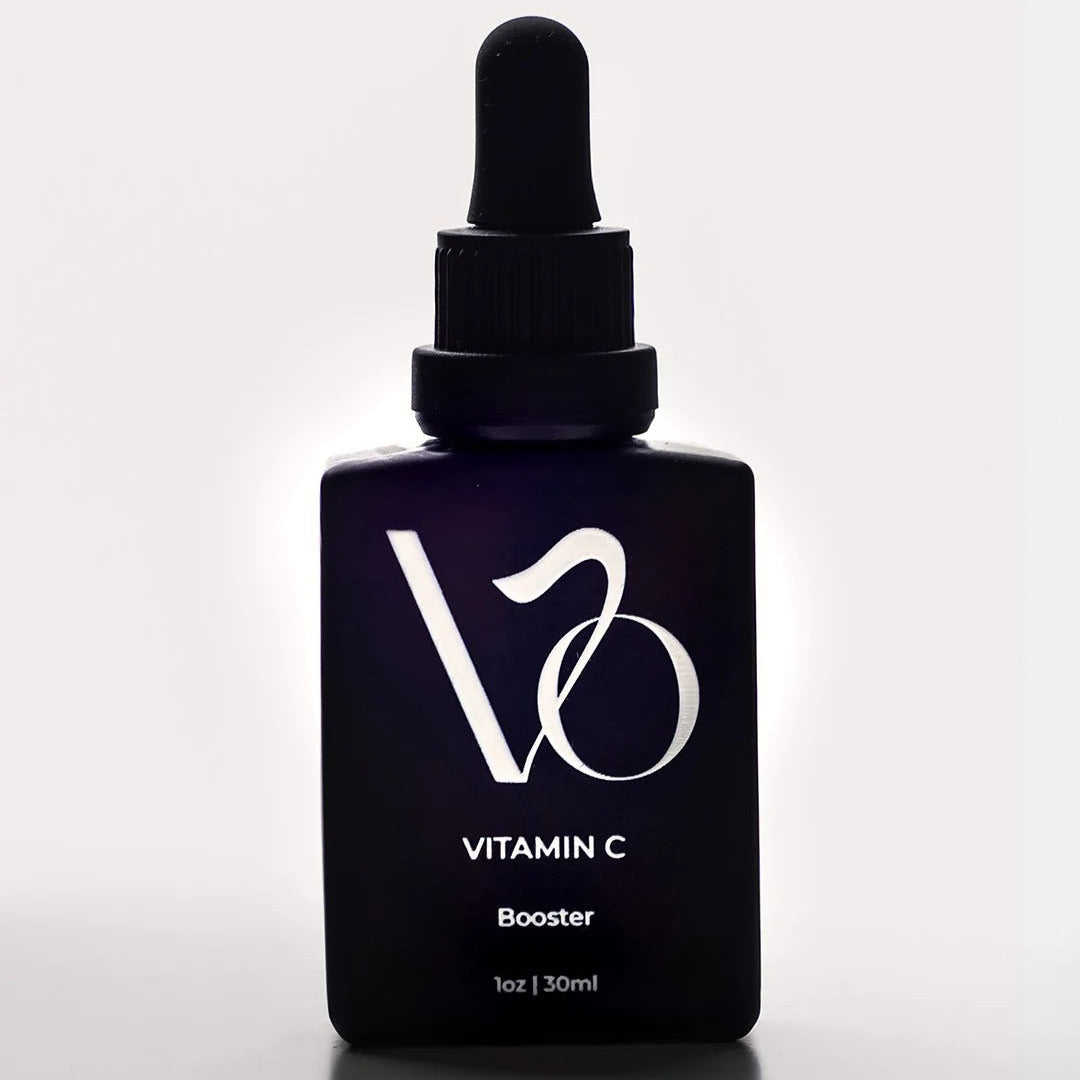 Black bottle of Vitamin C Booster with dropper on a white background